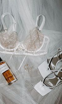 Bridal lingerie and nightwear set displayed on a wedding veil – Lingerie & Nightwear