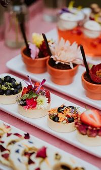 Canapes and mini desserts served in small pots at wedding reception – Wedding Catering