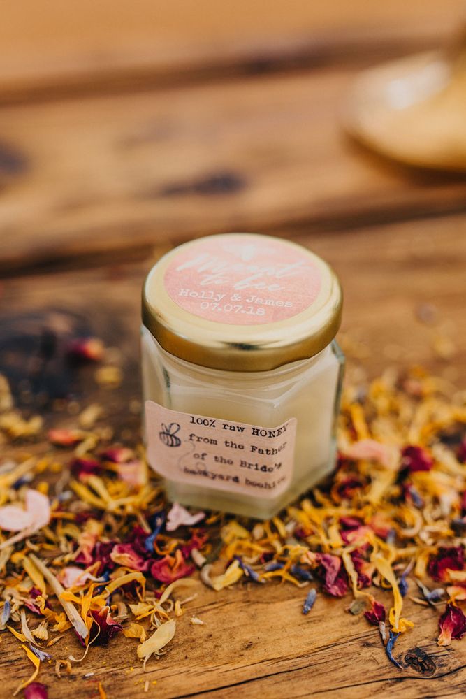 Personalised labelled jar of pure honey for the wedding favours 