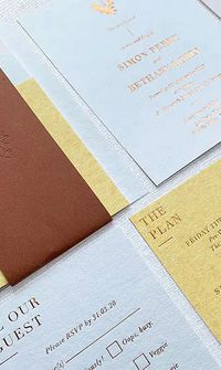 Flat lay of wedding invitations and RSVP cards – Wedding Stationery