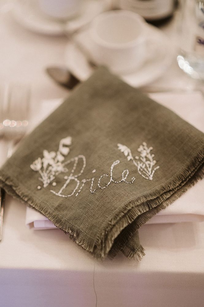 Embroidered napkin and place name in one for wedding favours 