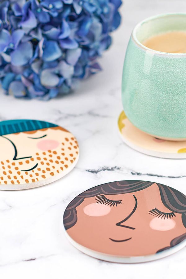 Personalised couples pottery face coasters, traditional 8 year anniversary gift from Not On The High Street.