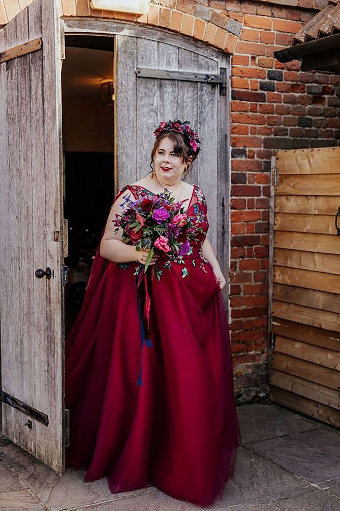 Bride wears red alternative wedding dress
