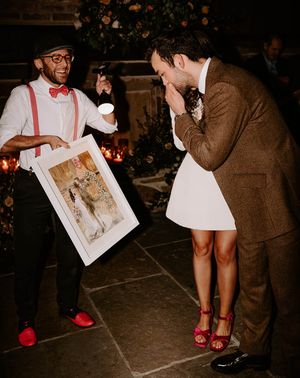 a live wedding illustrator produces a painting wedding keepsake