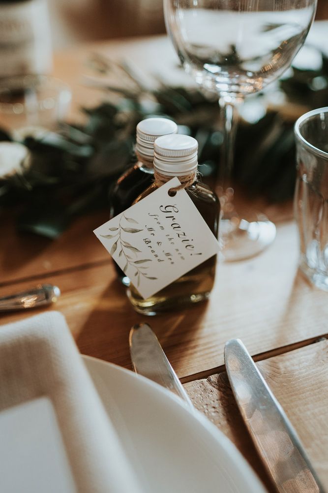 Mini bottles of olive oil with a label for an Italian theme wedding 
